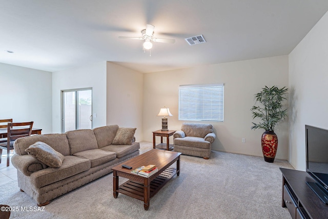 12622 N Wildrose Dr, Marana, AZ 85653 - living room featuring a ceiling fan and light carpet