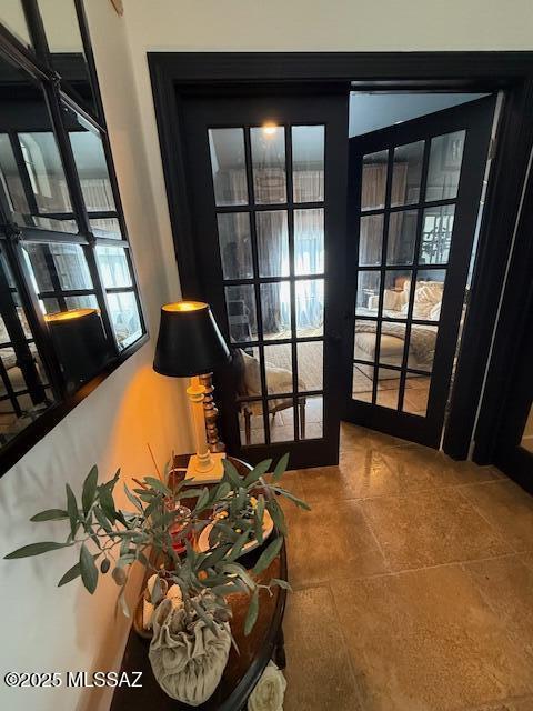 7774 E Cleary Way, Tucson, AZ 85715 - entryway with french doors and tile patterned floors