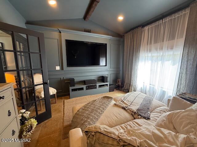7774 E Cleary Way, Tucson, AZ 85715 - living area featuring light tile patterned floors and a decorative wall