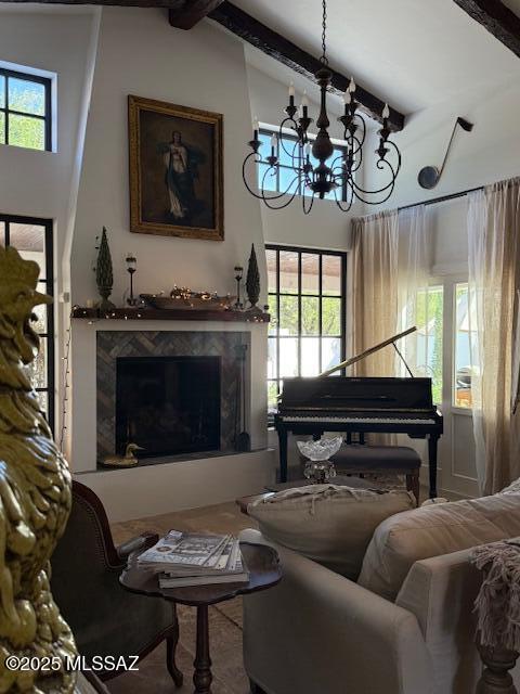7774 E Cleary Way, Tucson, AZ 85715 - living room with a chandelier and a fireplace