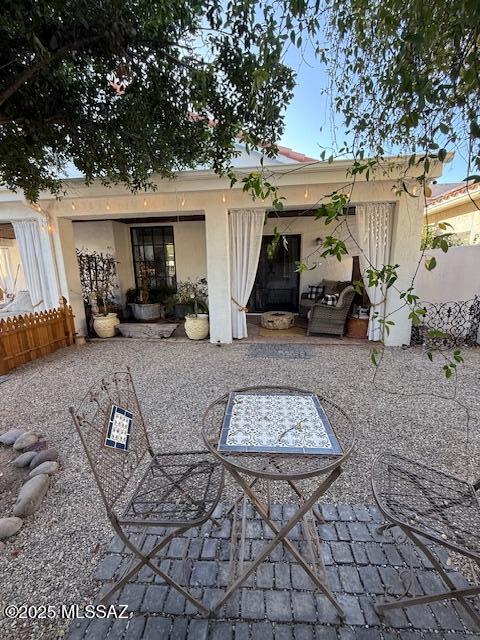 7774 E Cleary Way, Tucson, AZ 85715 - back of property with a patio and stucco siding