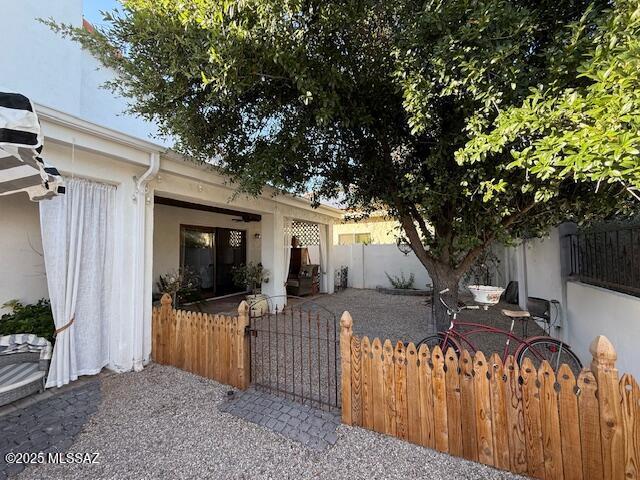 7774 E Cleary Way, Tucson, AZ 85715 - view of front facade with a patio area and stucco siding
