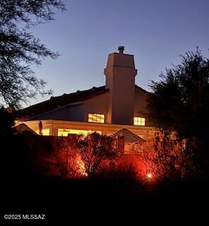7774 E Cleary Way, Tucson, AZ 85715 - rear view of house featuring a chimney