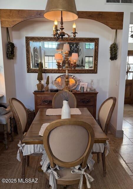 7774 E Cleary Way, Tucson, AZ 85715 - dining space with a chandelier and baseboards