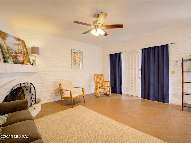 641 W Las Lomitas Rd, Tucson, AZ 85704 - living area featuring ceiling fan and a fireplace with raised hearth