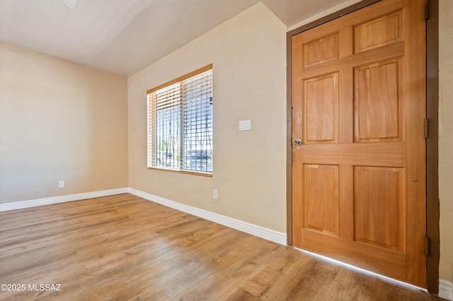2002 E Pinon Dr, Tucson, AZ 85706 - spare room with light wood-style flooring and baseboards