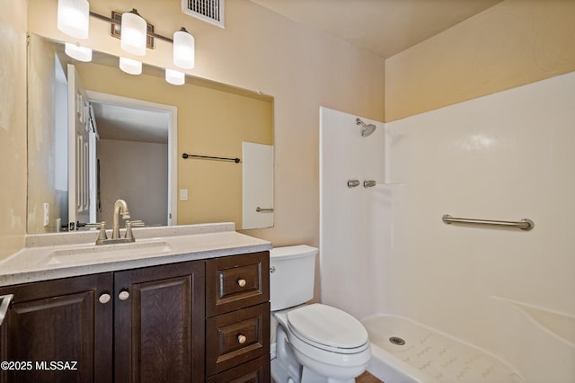 2002 E Pinon Dr, Tucson, AZ 85706 - full bath featuring a shower, toilet, and vanity