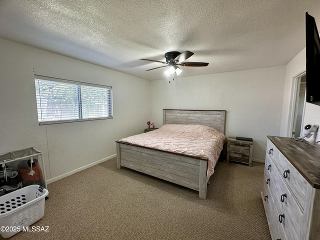 1609 S 12th Ave, Safford, AZ 85546 - bedroom featuring carpet flooring, a textured ceiling, baseboards, and ceiling fan