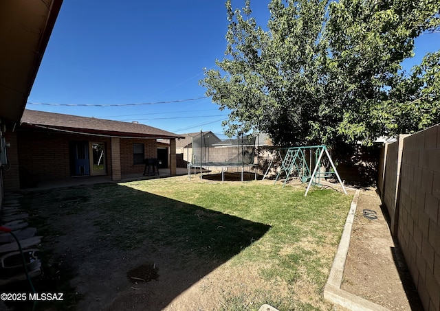 1609 S 12th Ave, Safford, AZ 85546 - view of yard with a trampoline and a playground