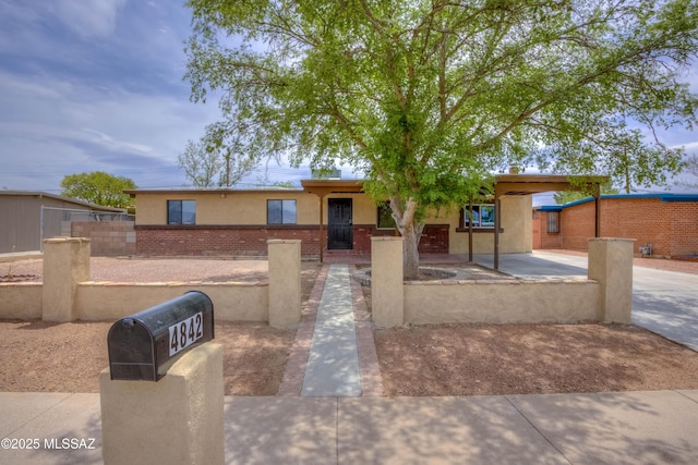 4842 E 27th St, Tucson, AZ 85711 - ranch-style home with stucco siding and fence