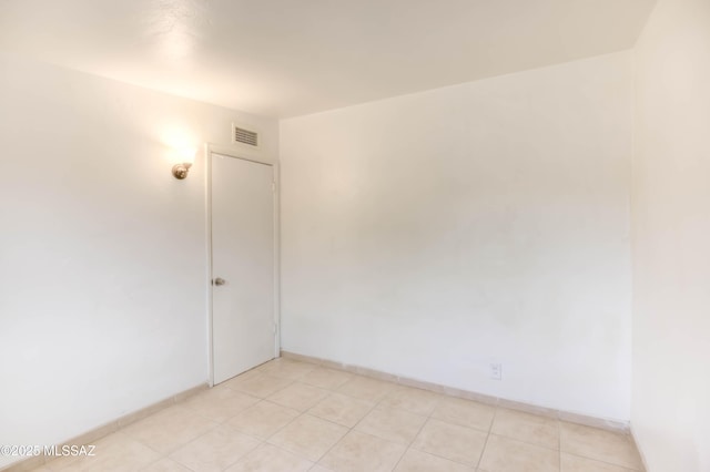 4842 E 27th St, Tucson, AZ 85711 - spare room with baseboards