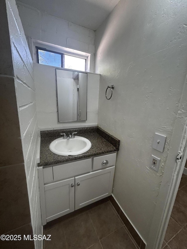 139 E 35th St, Tucson, AZ 85713 - bathroom with vanity and tile patterned floors