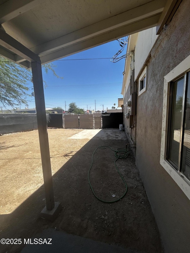 139 E 35th St, Tucson, AZ 85713 - fenced backyard featuring a patio area