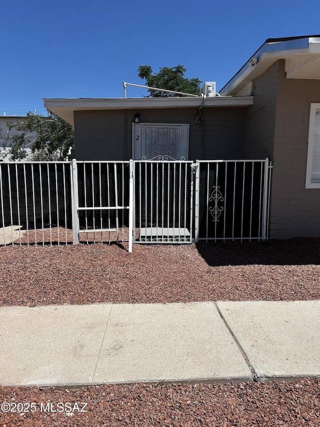 139 E 35th St, Tucson, AZ 85713 - view of front facade featuring concrete block siding