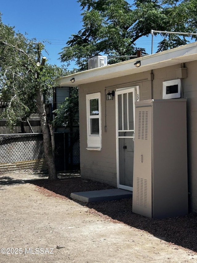 139 E 35th St, Tucson, AZ 85713 - view of exterior entry with concrete block siding