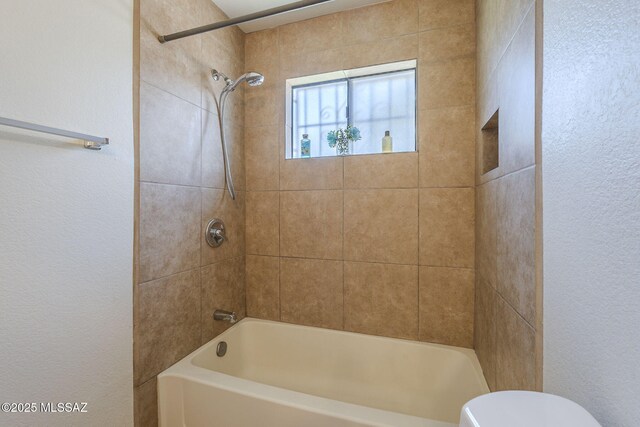 1741 W Maplewood Dr, Tucson, AZ 85746 - full bathroom with toilet, shower / washtub combination, and a textured wall
