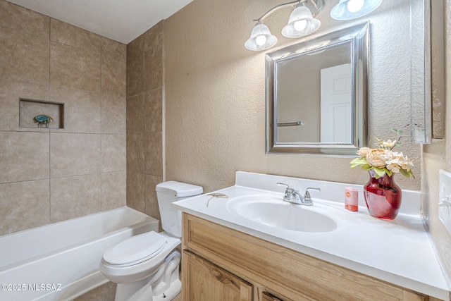 1741 W Maplewood Dr, Tucson, AZ 85746 - full bath with toilet, vanity, a textured wall, and shower / tub combination
