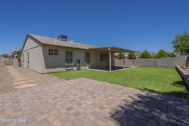 1741 W Maplewood Dr, Tucson, AZ 85746 - rear view of house featuring central air condition unit and a patio