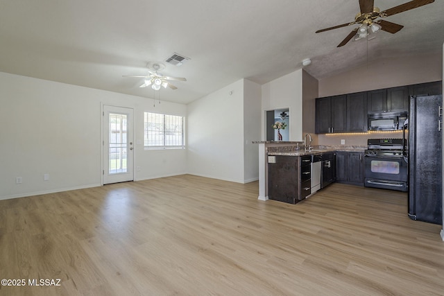 1741 W Maplewood Dr, Tucson, AZ 85746 - kitchen featuring black appliances, a ceiling fan, open floor plan, a sink, and vaulted ceiling