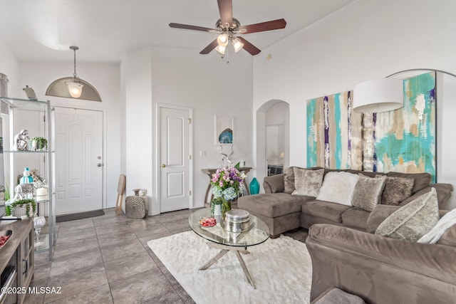 5608 Shady Grove, Tucson, AZ 85742 - living area with arched walkways and ceiling fan