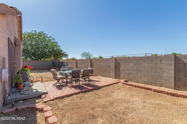 5608 Shady Grove, Tucson, AZ 85742 - fenced backyard featuring a patio