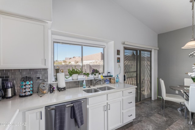 5608 Shady Grove, Tucson, AZ 85742 - kitchen featuring a sink, dishwasher, decorative backsplash, dark marble finish floors, and high vaulted ceiling