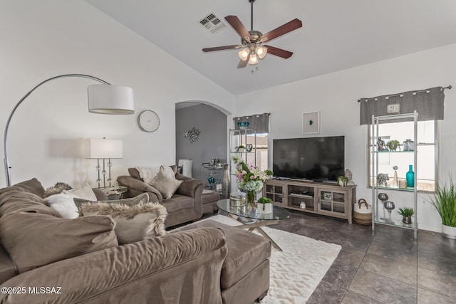 5608 Shady Grove, Tucson, AZ 85742 - living room with arched walkways, a ceiling fan, and vaulted ceiling