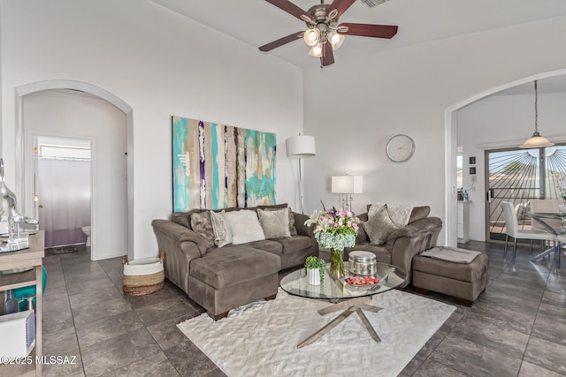 5608 Shady Grove, Tucson, AZ 85742 - living area featuring arched walkways and ceiling fan
