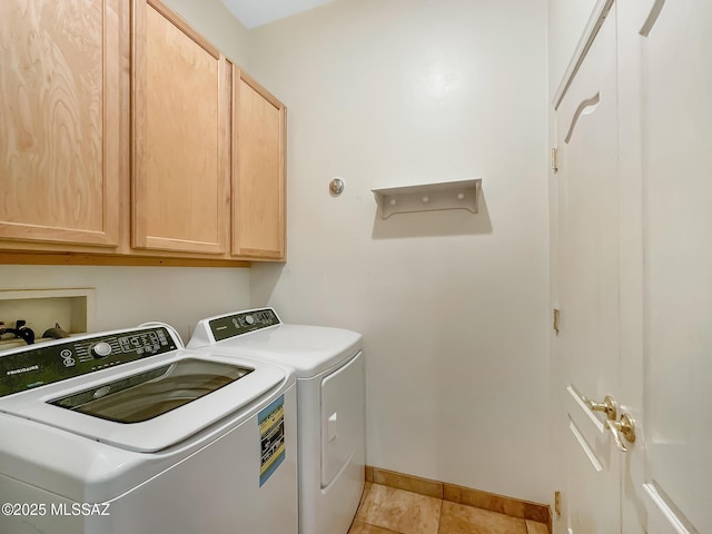 13401 N Rancho Vistoso Blvd Unit 190, Oro Valley, AZ 85755 - laundry room featuring washer and dryer, cabinet space, baseboards, and light tile patterned floors