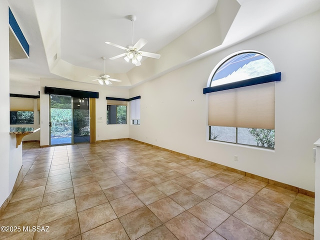 13401 N Rancho Vistoso Blvd Unit 190, Oro Valley, AZ 85755 - unfurnished room featuring light tile patterned floors, ceiling fan, and baseboards