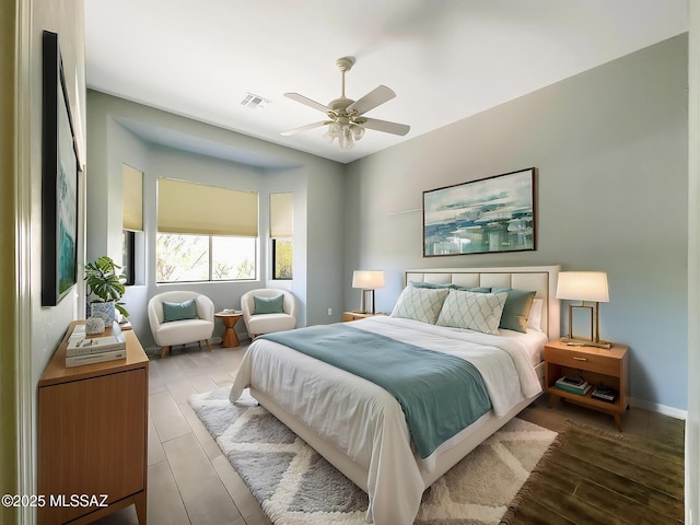 13401 N Rancho Vistoso Blvd Unit 190, Oro Valley, AZ 85755 - bedroom featuring baseboards and a ceiling fan