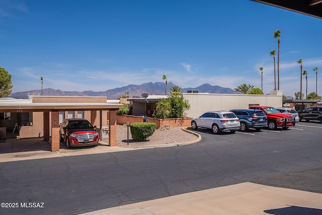 413 N Calle Del Diablo, Green Valley, AZ 85614 - view of front of home featuring uncovered parking and a mountain view