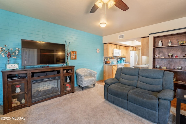 413 N Calle Del Diablo, Green Valley, AZ 85614 - living area with ceiling fan and light colored carpet