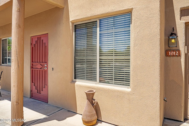 1012 W Via Del Placio, Green Valley, AZ 85614 - entrance to property featuring stucco siding