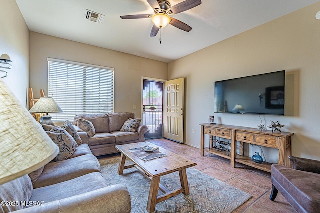 1012 W Via Del Placio, Green Valley, AZ 85614 - living area with ceiling fan and tile patterned flooring