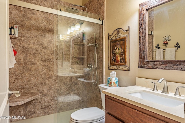 1012 W Via Del Placio, Green Valley, AZ 85614 - full bath featuring a stall shower, toilet, a textured wall, and vanity