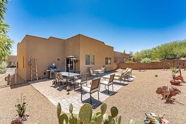 1012 W Via Del Placio, Green Valley, AZ 85614 - fenced backyard with a patio and a grill