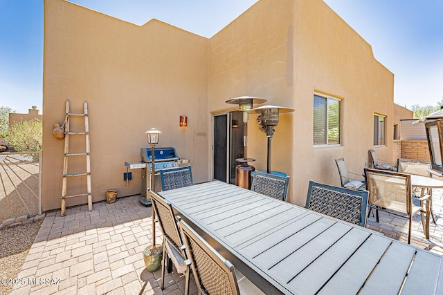 1012 W Via Del Placio, Green Valley, AZ 85614 - view of patio with outdoor dining area and area for grilling