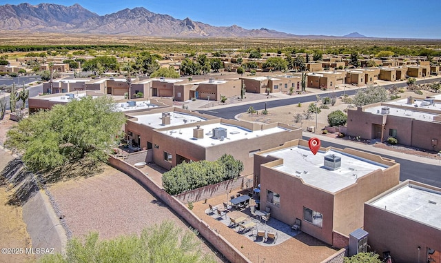 1012 W Via Del Placio, Green Valley, AZ 85614 - aerial perspective of suburban area featuring a mountainous background