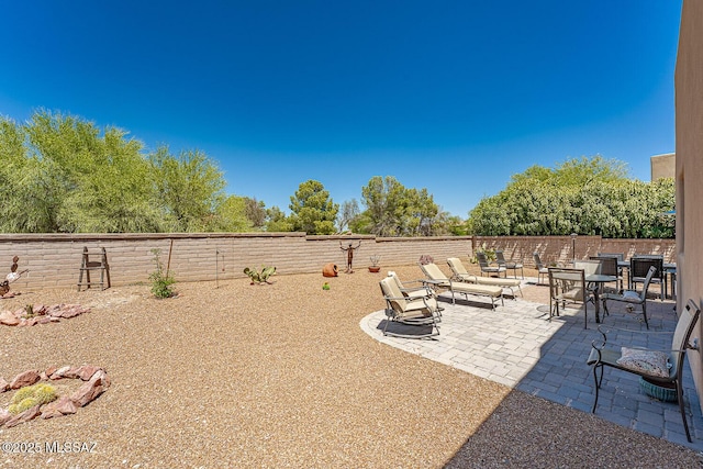 1012 W Via Del Placio, Green Valley, AZ 85614 - fenced backyard featuring a patio area