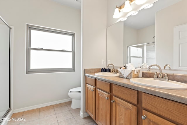 45 N Lookout Knob Dr, Sahuarita, AZ 85629 - full bathroom with healthy amount of natural light, a shower stall, double vanity, and toilet