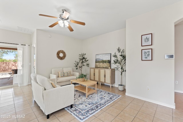 45 N Lookout Knob Dr, Sahuarita, AZ 85629 - living area with light tile patterned floors, a ceiling fan, and baseboards