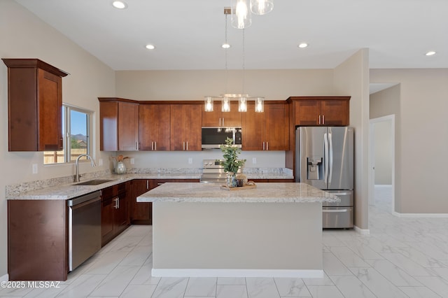 1814 Cajeme Ct, Rio Rico, AZ 85648 - kitchen featuring stainless steel appliances, a sink, light marble finish flooring, a kitchen island, and recessed lighting