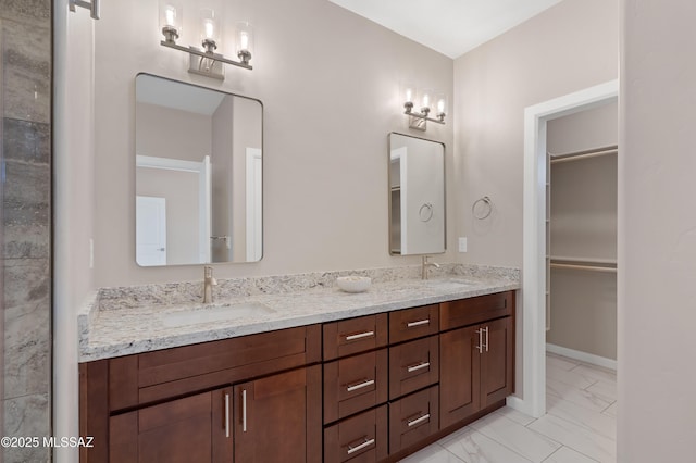 1814 Cajeme Ct, Rio Rico, AZ 85648 - full bath featuring marble finish floors, double vanity, and a walk in closet