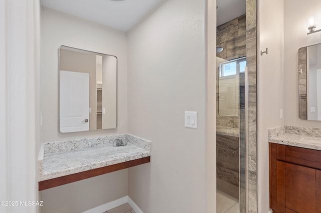 1814 Cajeme Ct, Rio Rico, AZ 85648 - bathroom with a shower stall, vanity, and baseboards