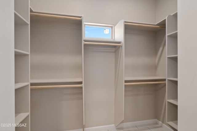 1814 Cajeme Ct, Rio Rico, AZ 85648 - walk in closet featuring tile patterned flooring