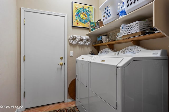 380 E Via Puente De La Lluvia, Sahuarita, AZ 85629 - laundry area with washing machine and dryer and light tile patterned flooring