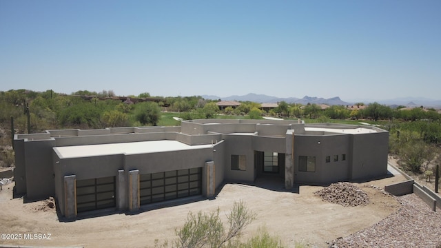 14295 N Silent Sky Pl, Marana, AZ 85658 - pueblo revival-style home with a mountain view and stucco siding