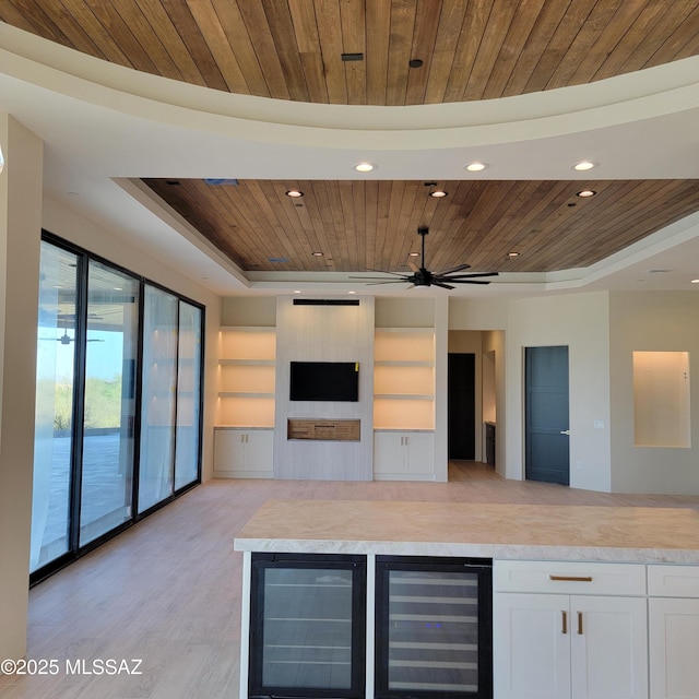 14295 N Silent Sky Pl, Marana, AZ 85658 - indoor dry bar featuring wine cooler, wooden ceiling, recessed lighting, light wood-style floors, and a raised ceiling
