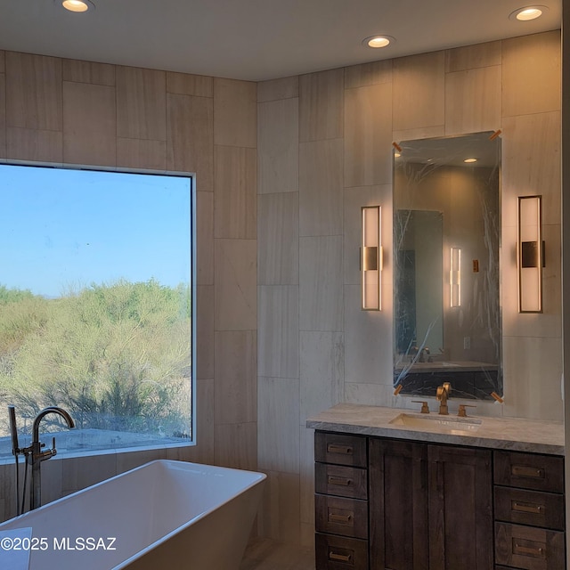 14295 N Silent Sky Pl, Marana, AZ 85658 - full bath with vanity, a freestanding bath, and recessed lighting